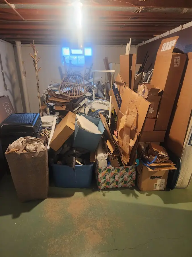 Roll-off dumpster container at job site for 4 Yard Dumpster Rental in Springdale